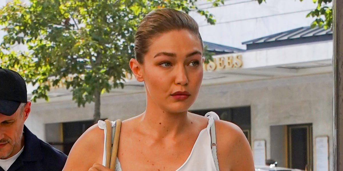 Gigi Hadid Beats the Paris Heat With a Slouchy Prada Tank and Lace-Trimmed Skirt