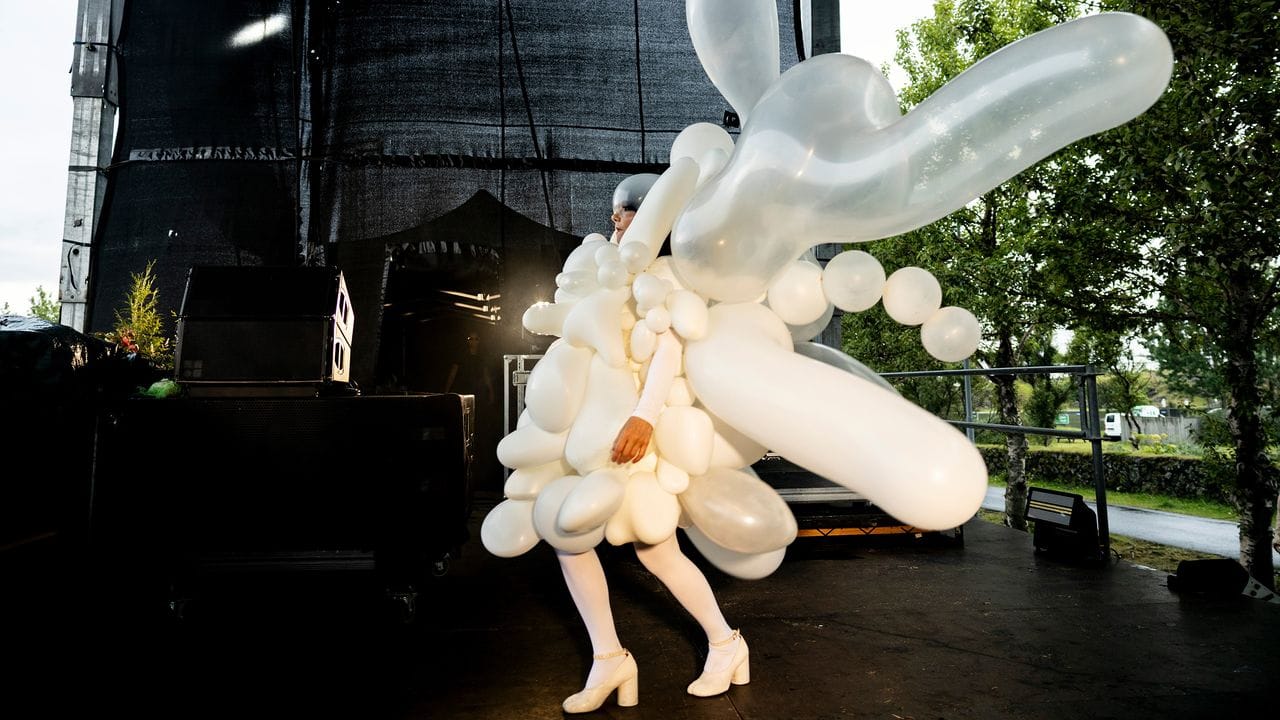 The Wild Story Behind Björk’s Robert Wun Balloon Look—and Her Solar Eclipse Rave in Iceland