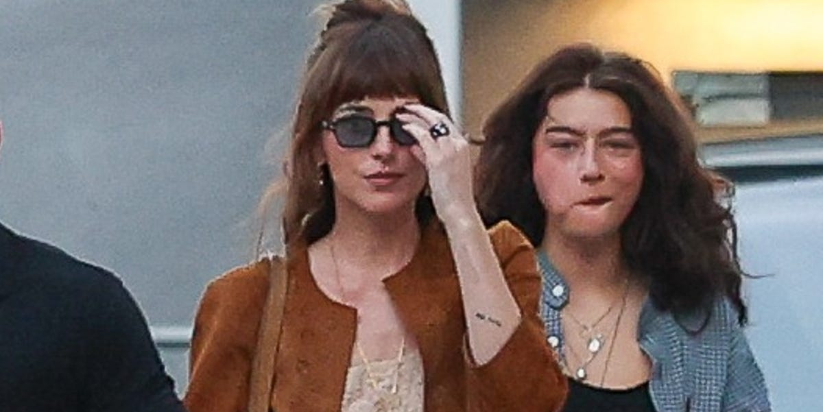 Dakota Johnson Pulls Off a Surprising Color Combination With Her Celine Suede Jacket and a Vintage Slip