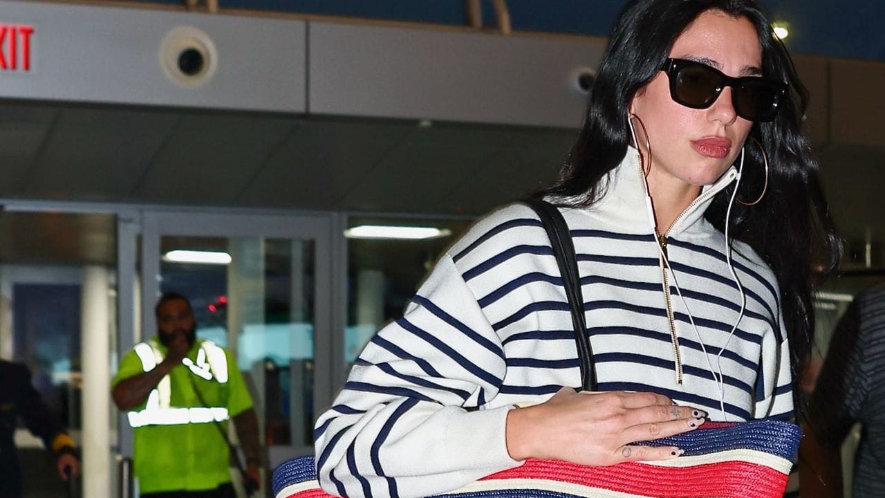 Dua Lipa Supersizes the Vacation Tote Bag—Airline Restrictions Be Damned