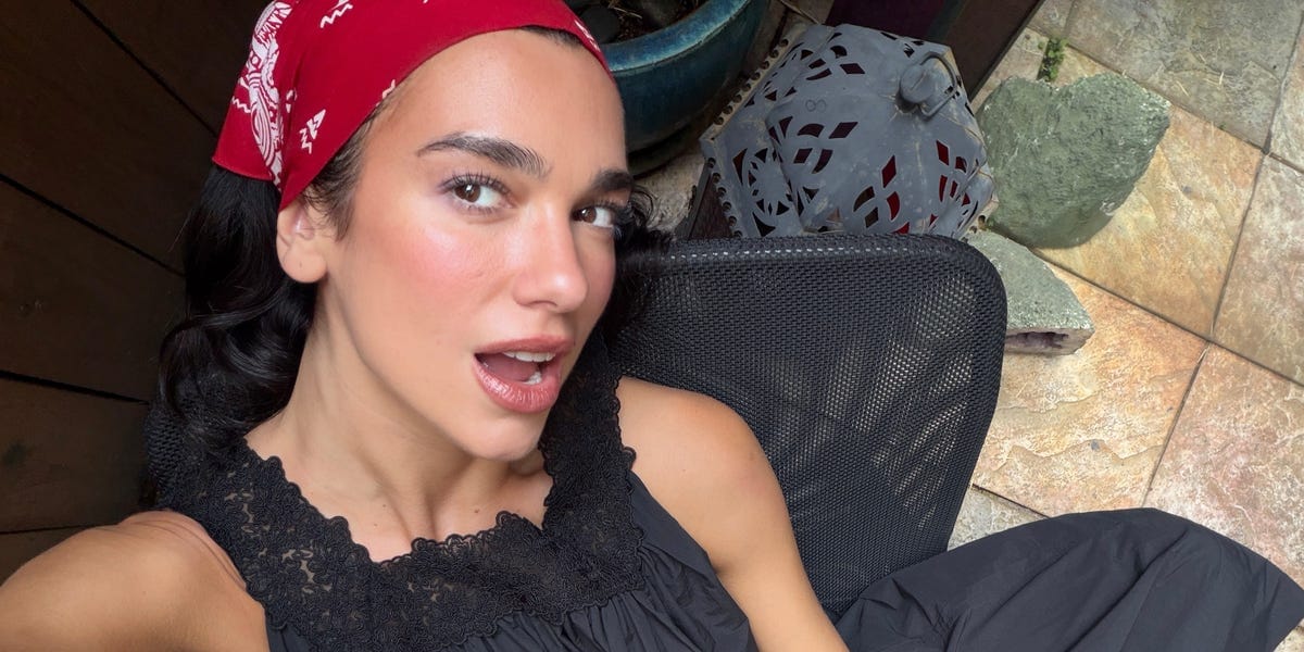 Dua Lipa Plays Tourist in NYC With a Bandana, Boots, and More of Summer’s Biggest Trends