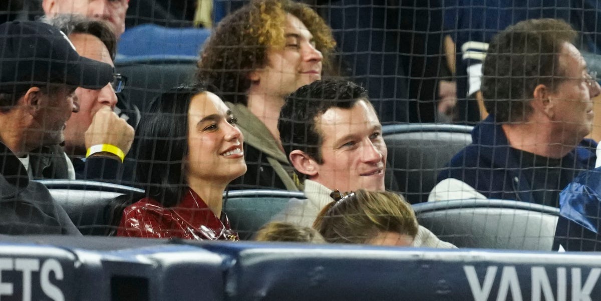 Dua Lipa’s Yankees-Night Look Included a Burgundy Croc Coat From Chanel’s Métiers d’Art Collection
