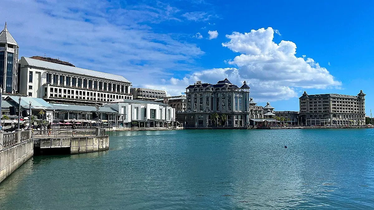 Blue water with multi-story buildings constructed around it