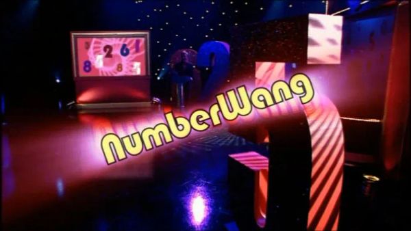 The set of fictional gameshow Numberwang, with the word NumberWang in crappy graphics superimposed