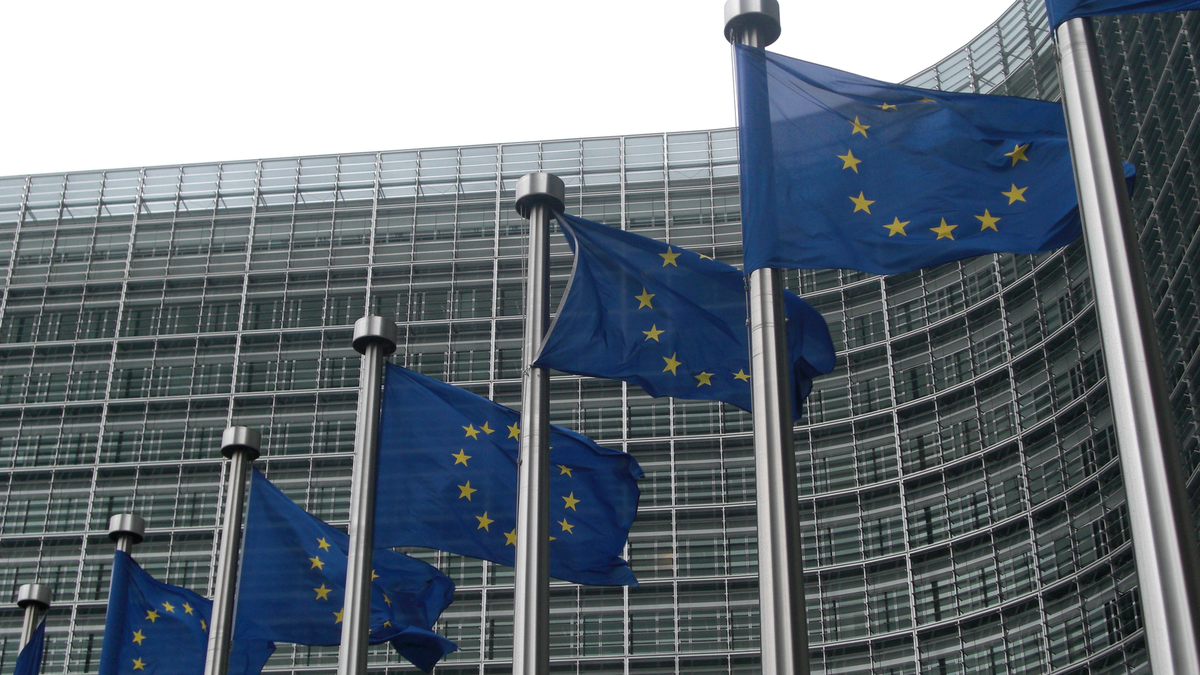 European Union flags outside the European Commission headquarters at the Berlaymont building in Brussels.