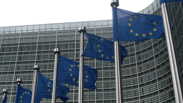 European Union flags outside the European Commission headquarters at the Berlaymont building in Brussels.