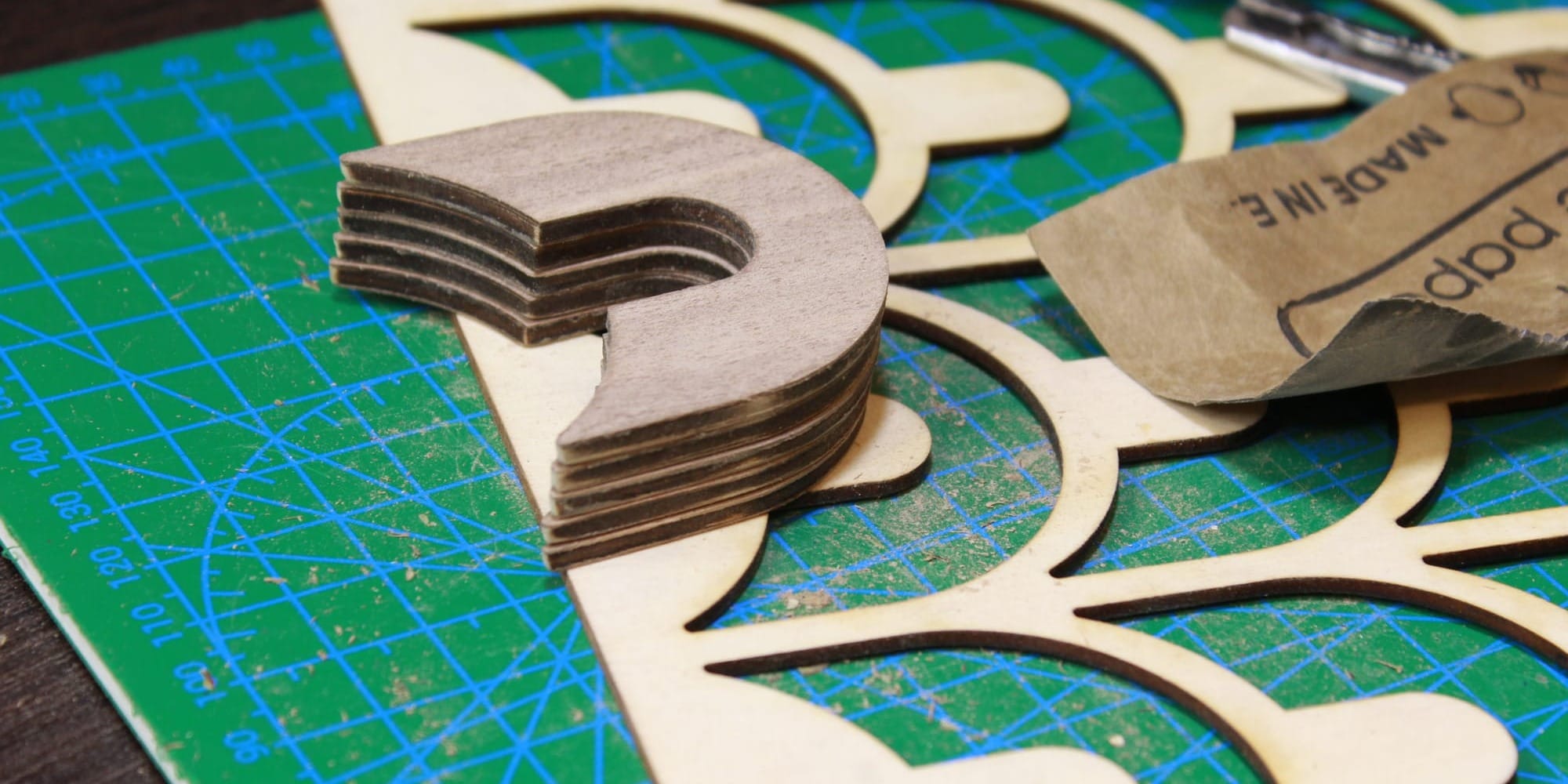 Photo of wooden parts after being sanded, covered with wood dust