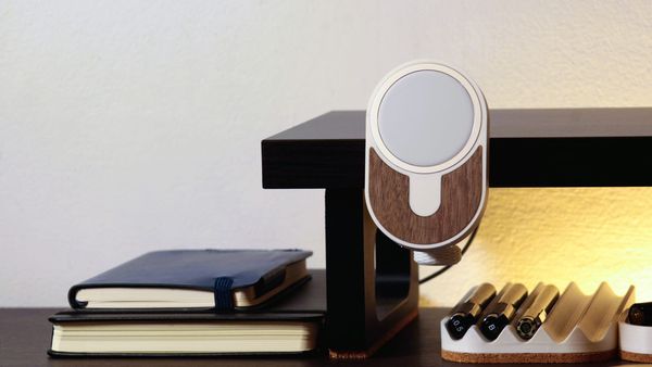 Photo of a 3D printed MagSafe phone holder for iPhones with a wooden accent tone