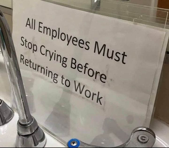 A sign that reads: "All Employees Must Stop Crying Before Returning to Work."