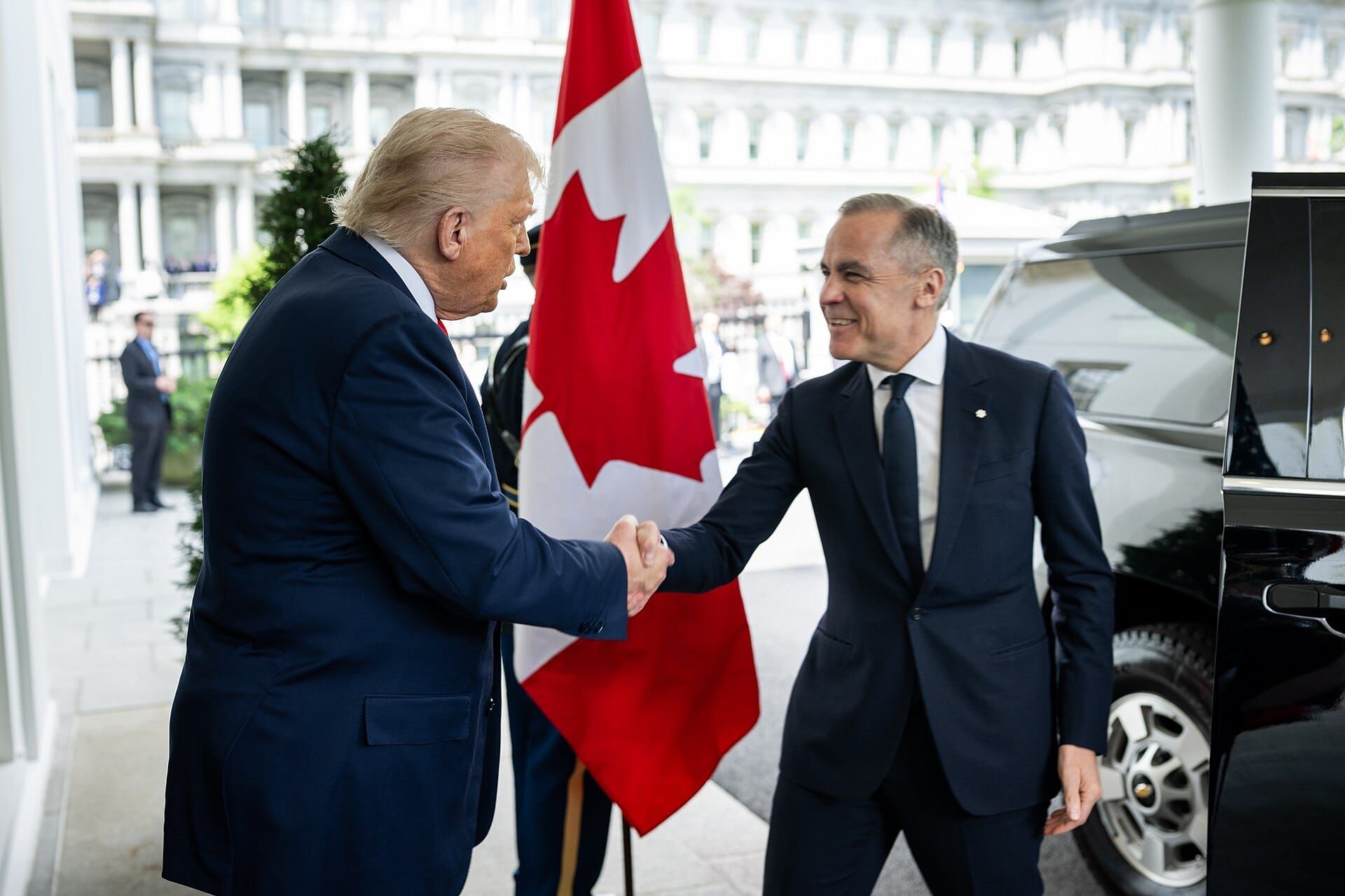 Photo showing U.S. President Donald Trump shaking hands with Prime Minister Mark Carney.
