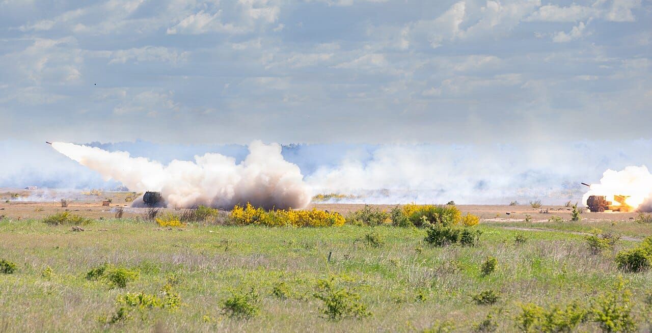 Picture of launchers firing HIMARS missiles.
