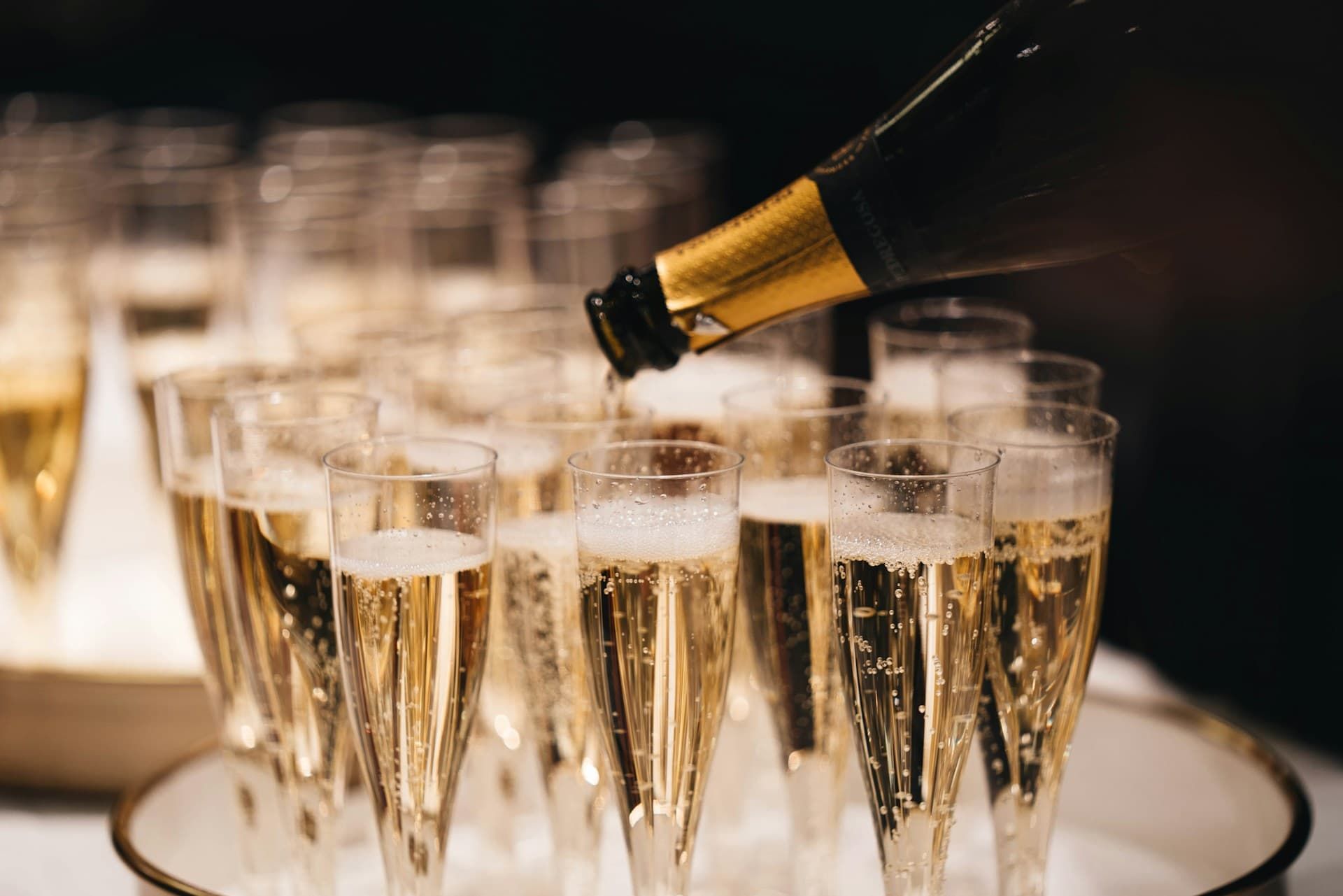 Champagne being poured into glasses