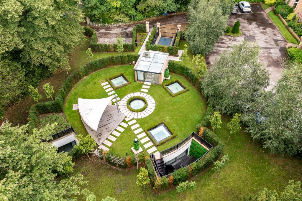 A "subterranean" mansion that's built entirely underground has gone on sale in Altrincham