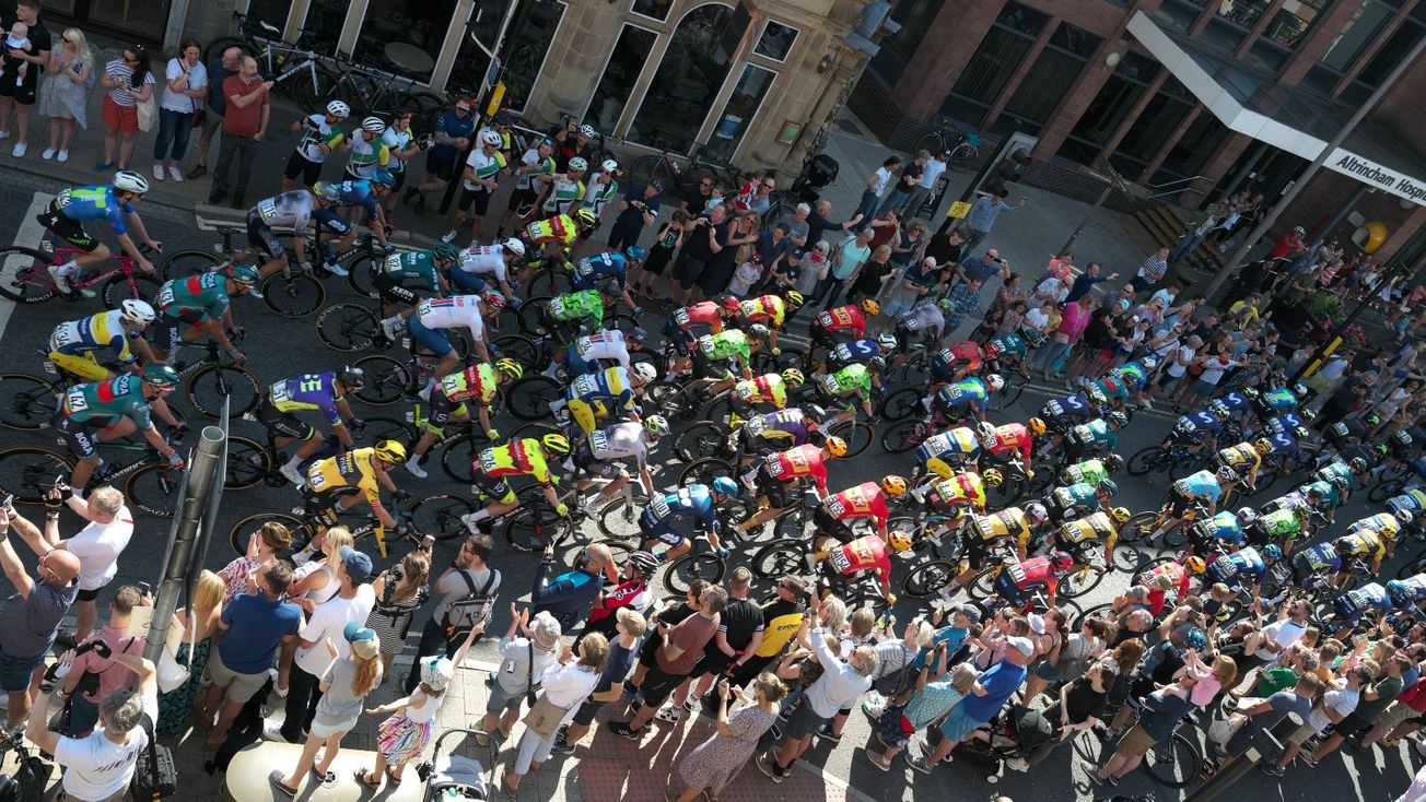 Pictures: Thousands line the streets as Tour of Britain opens in sunny Altrincham
