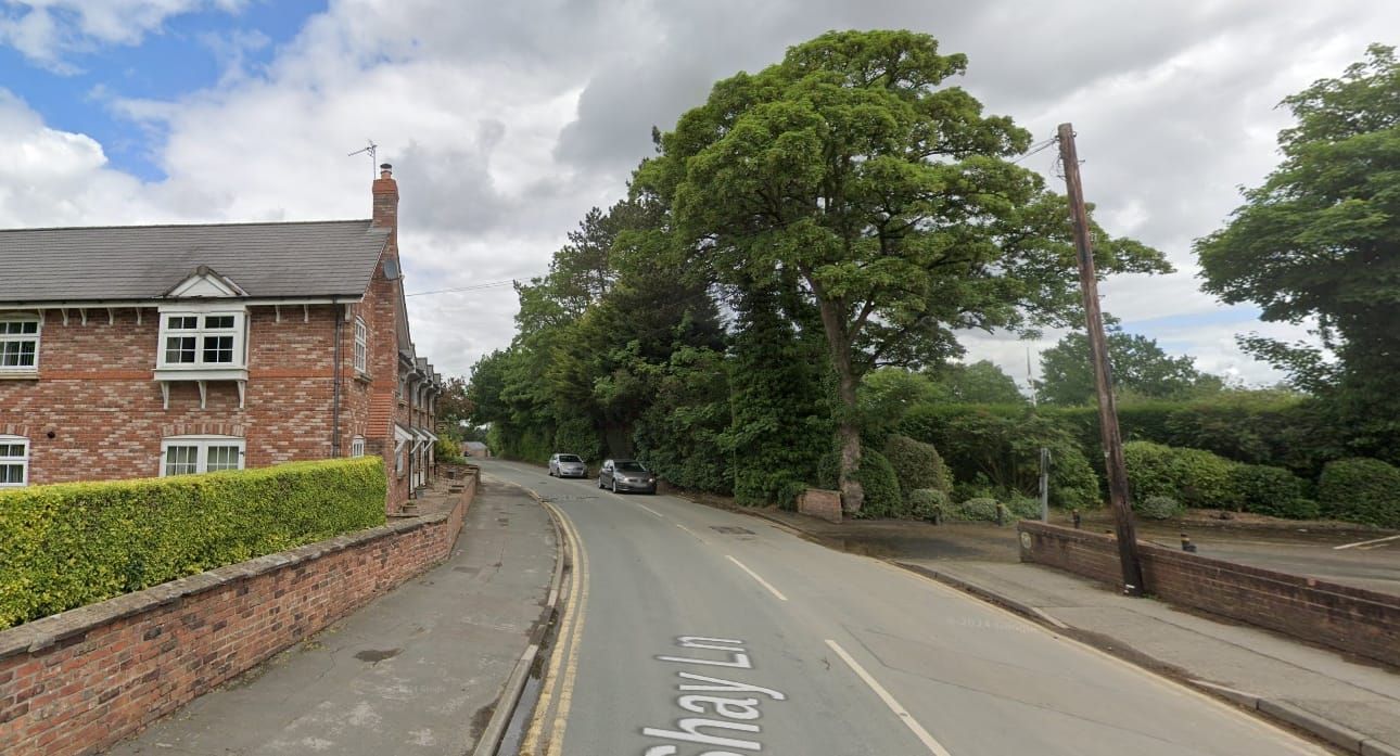 Pedestrian trapped under vehicle after Hale Barns collision