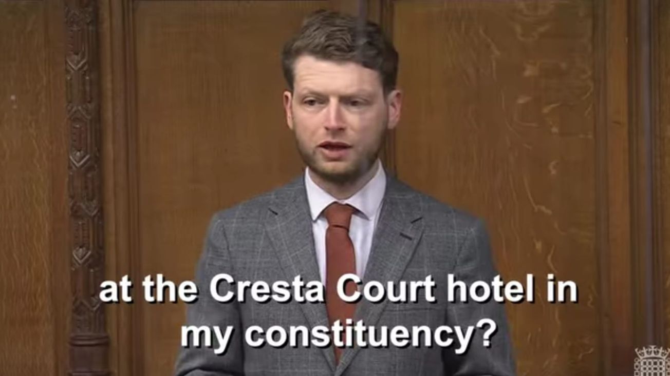 Local MP raises Cresta Court issue in Parliament as government insists it is "committed" to closing migrant hotels