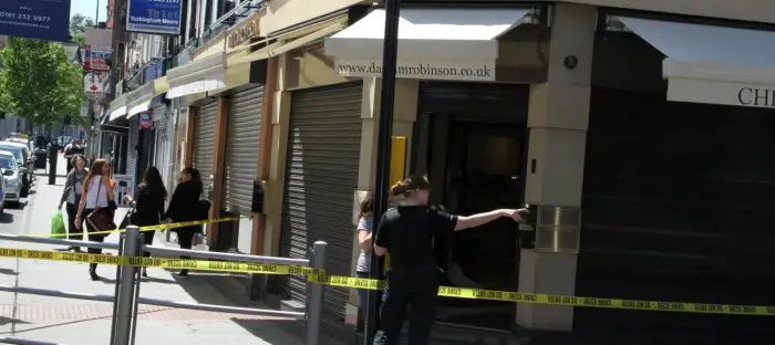 Police hunt for four men in balaclavas who launched brazen midday robbery on Altrincham jewellers