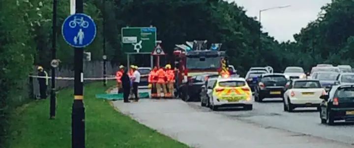 Driver “fell ill at the wheel” before crashing and veering down Timperley embankment