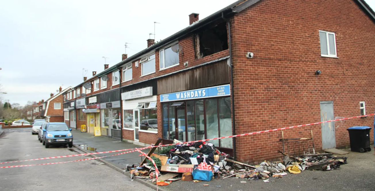 Woman escapes Timperley flat fire after being alerted by son