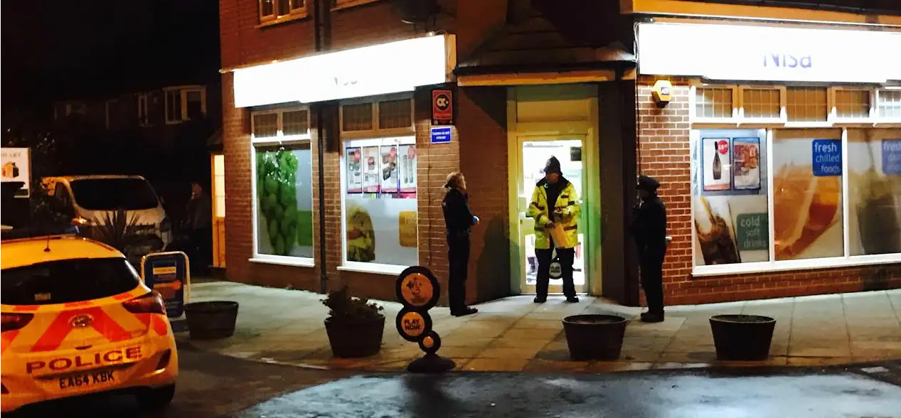 Man arrested after armed robbery on Timperley shop