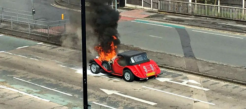 Vintage car bursts into flames on Altrincham dual carriageway