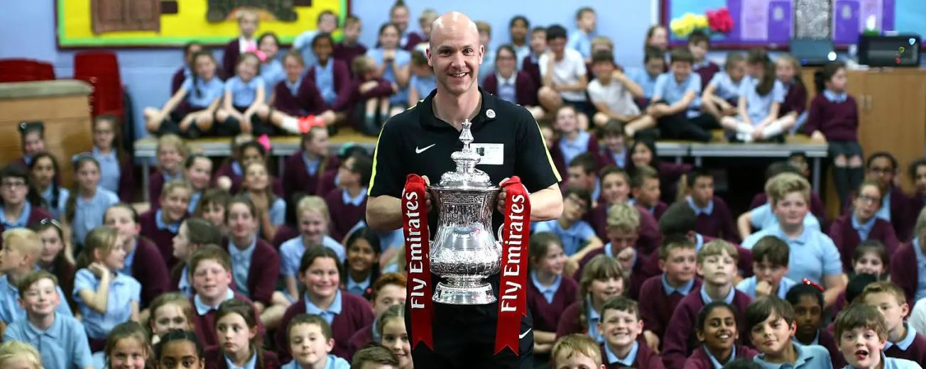 FA Cup Final referee pays special visit to former primary school in Timperley