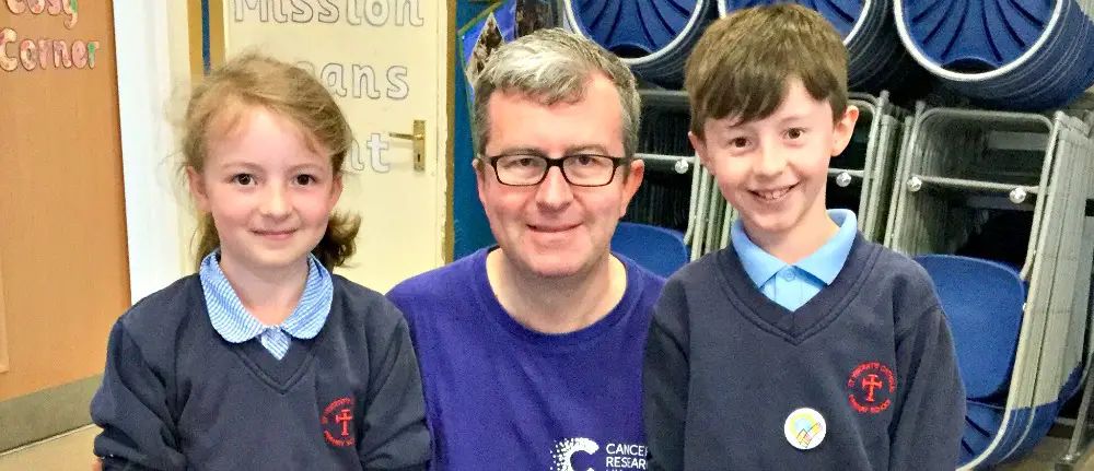 Altrincham schoolchildren’s cake sale raises over £1,000 for fire-hit Christie cancer research centre