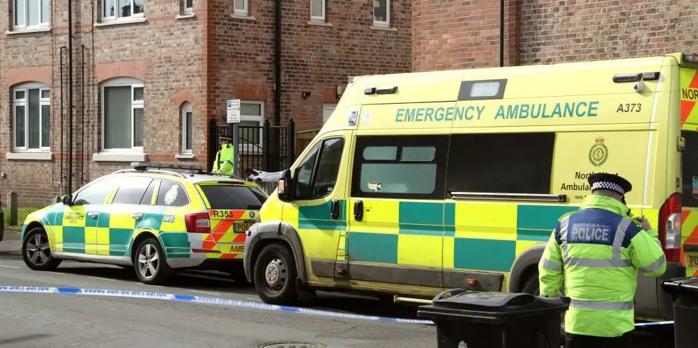 Man’s body found inside block of flats in Altrincham
