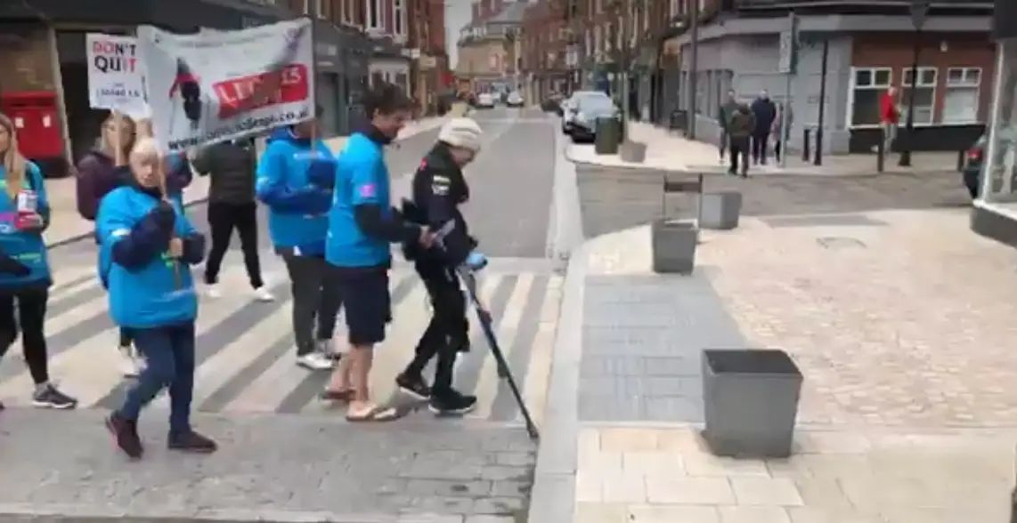 Watch: Paralysed woman uses bionic suit to walk through Altrincham as part of Greater Manchester Marathon