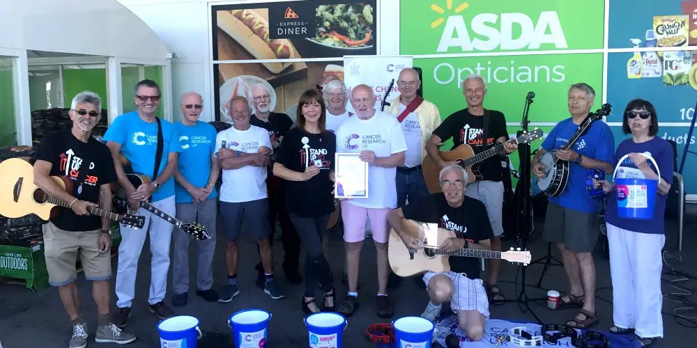 Altrincham charity buskers given national award by Cancer Research after raising £450,000