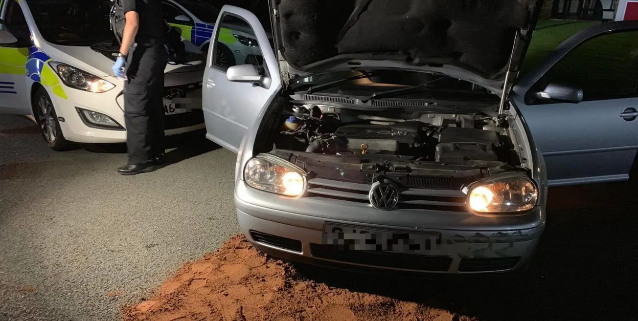 Stun gun recovered after speeding car crashes outside Altrincham Fire Station