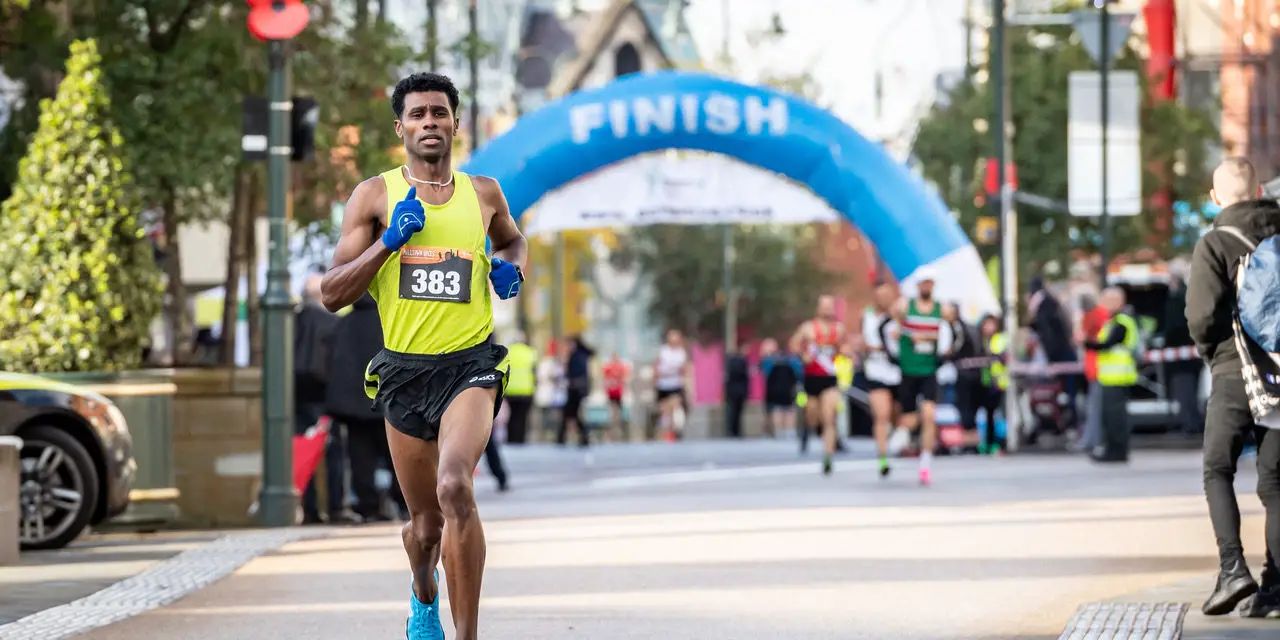 Altrincham runner smashes course record at Oldham Half Marathon