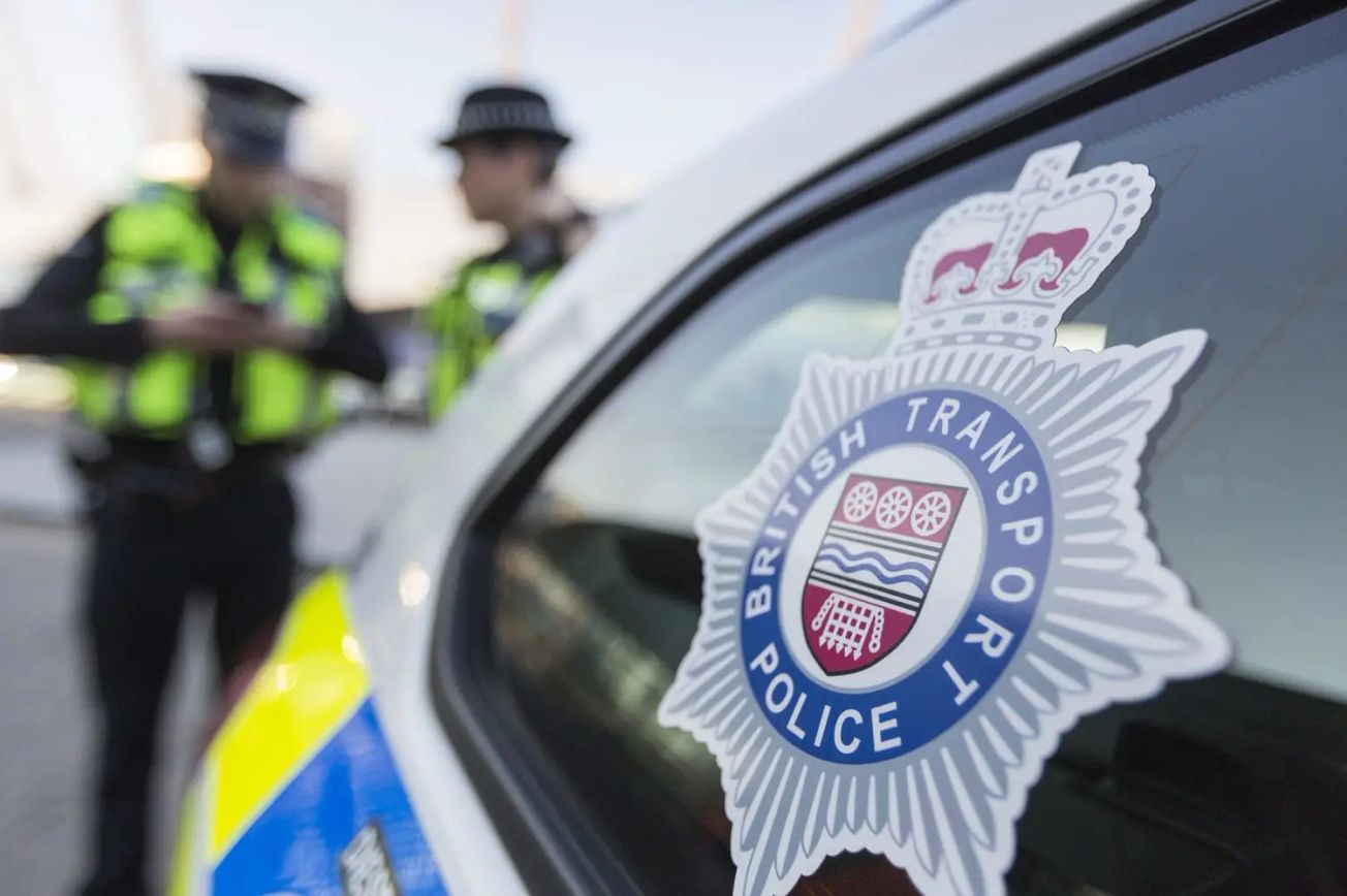 A person has been found dead on railway tracks near Altrincham