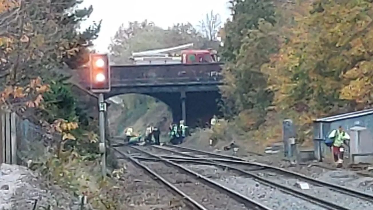 Man in hospital after falling from Hale Road bridge