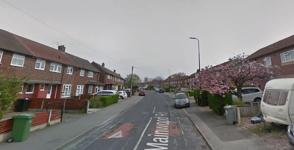 Two rescued after blaze at Timperley house