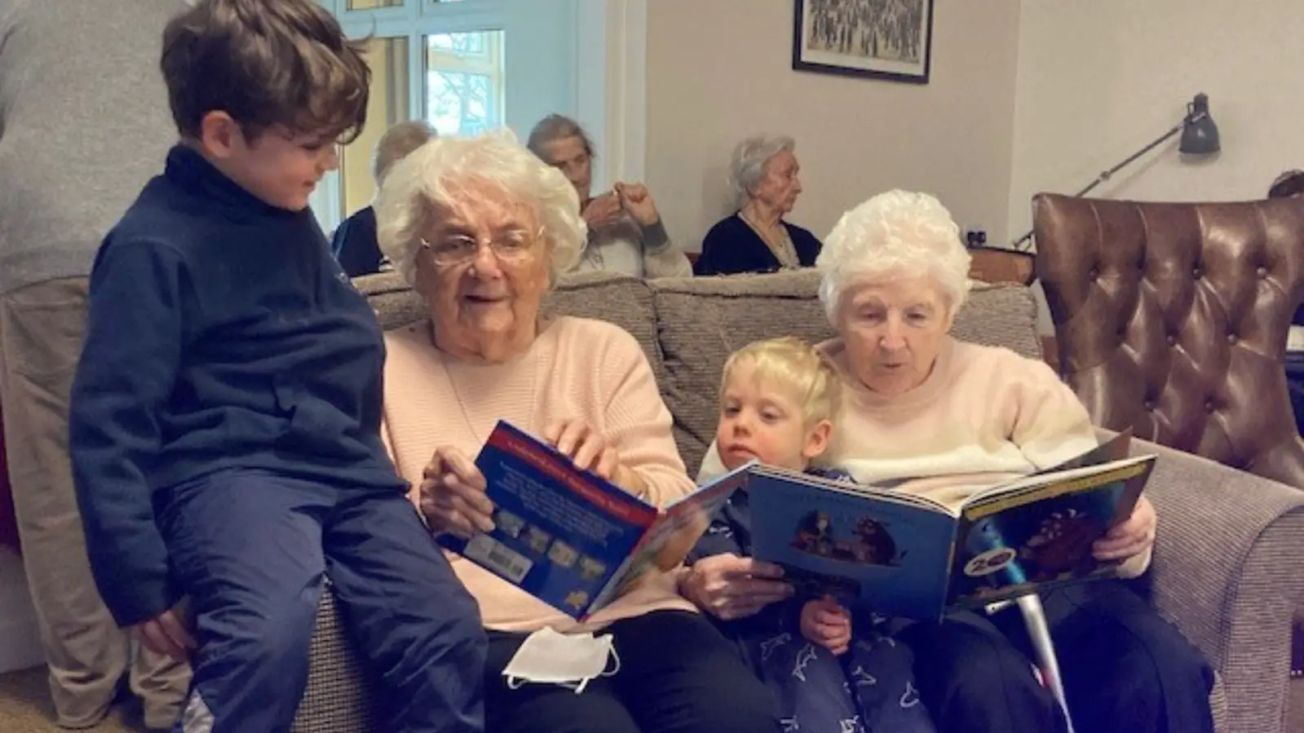 Hale Barns care home residents read to local nursery children as part of National Storytelling Week