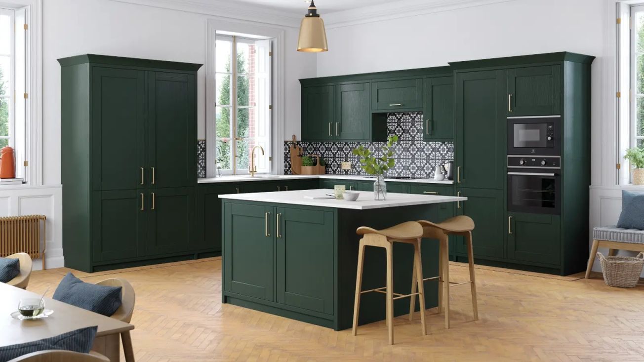 Blue or green is the must-have colour for your kitchen this summer, says Altrincham designer