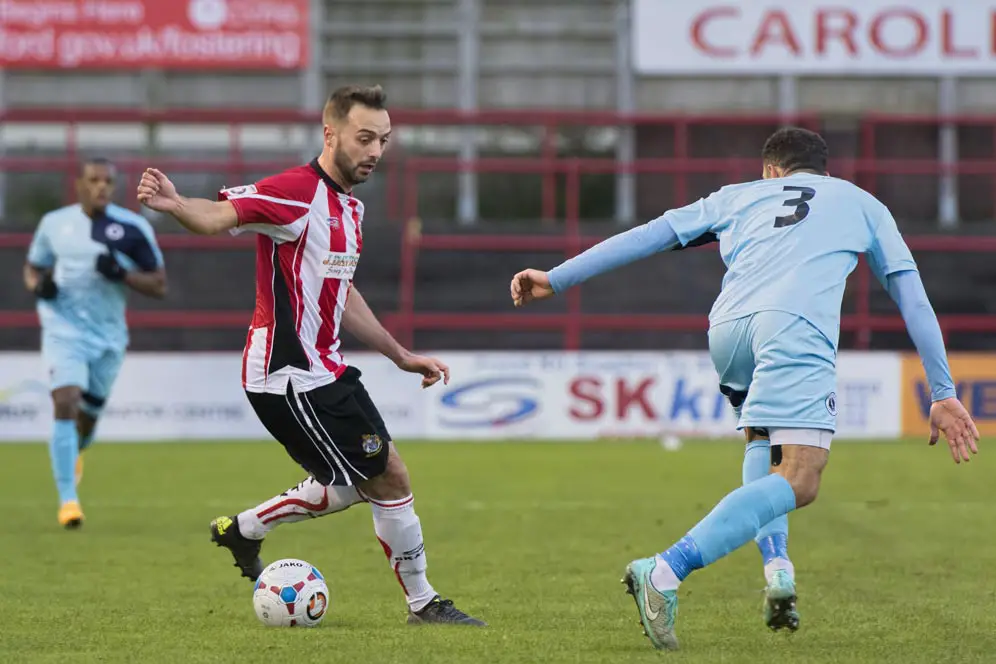 Ryan Crowther tries to turn his defender against Boreham Wood