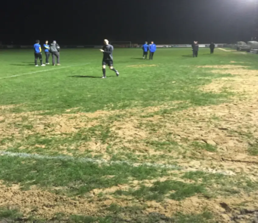 The match referee inspecting the pitch on January 6th