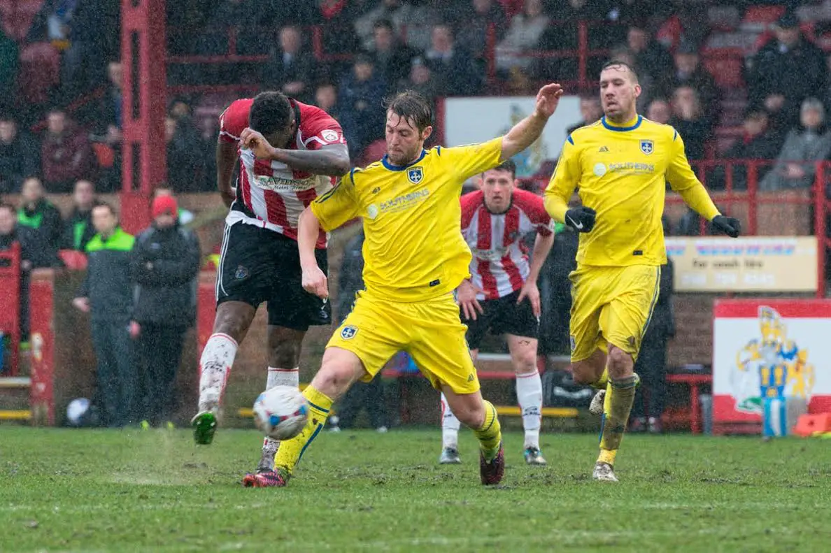 Michael Rankine's shot from distance beats the Guiseley keeper