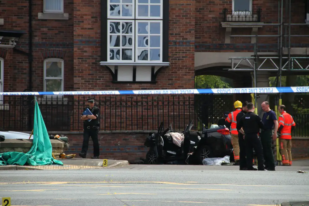 Pictures from the scene show just how damaged the black Toyota Auris was