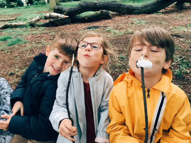 Young "bushcrafters" getting stuck in at Dunham Massey