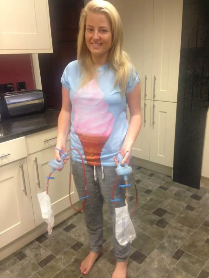 Charlotte with the unsightly surgical drains after her operation last year