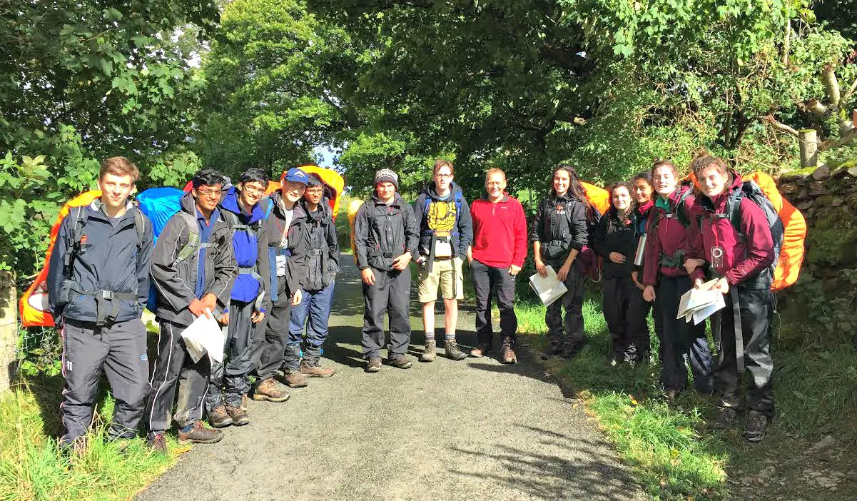 Centre manager Andy Allan (centre) with two groups taking part in their silver expedition