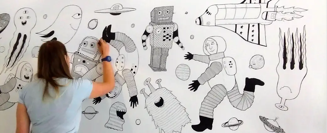 Some of the artwork already drawn on to the walls of the new café