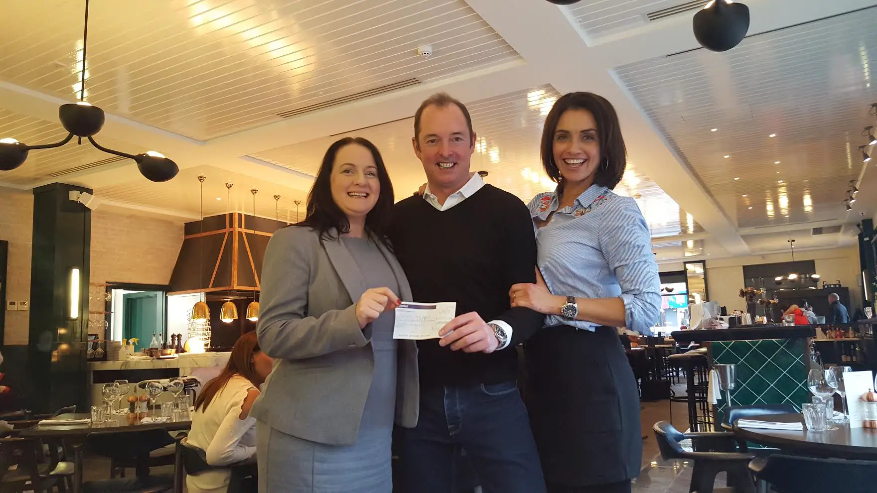 (l to r) Dee Drake of The Lalley Toy Appeal, Fox owner Danny Fox and Melissa Porter, broadcaster and journalist