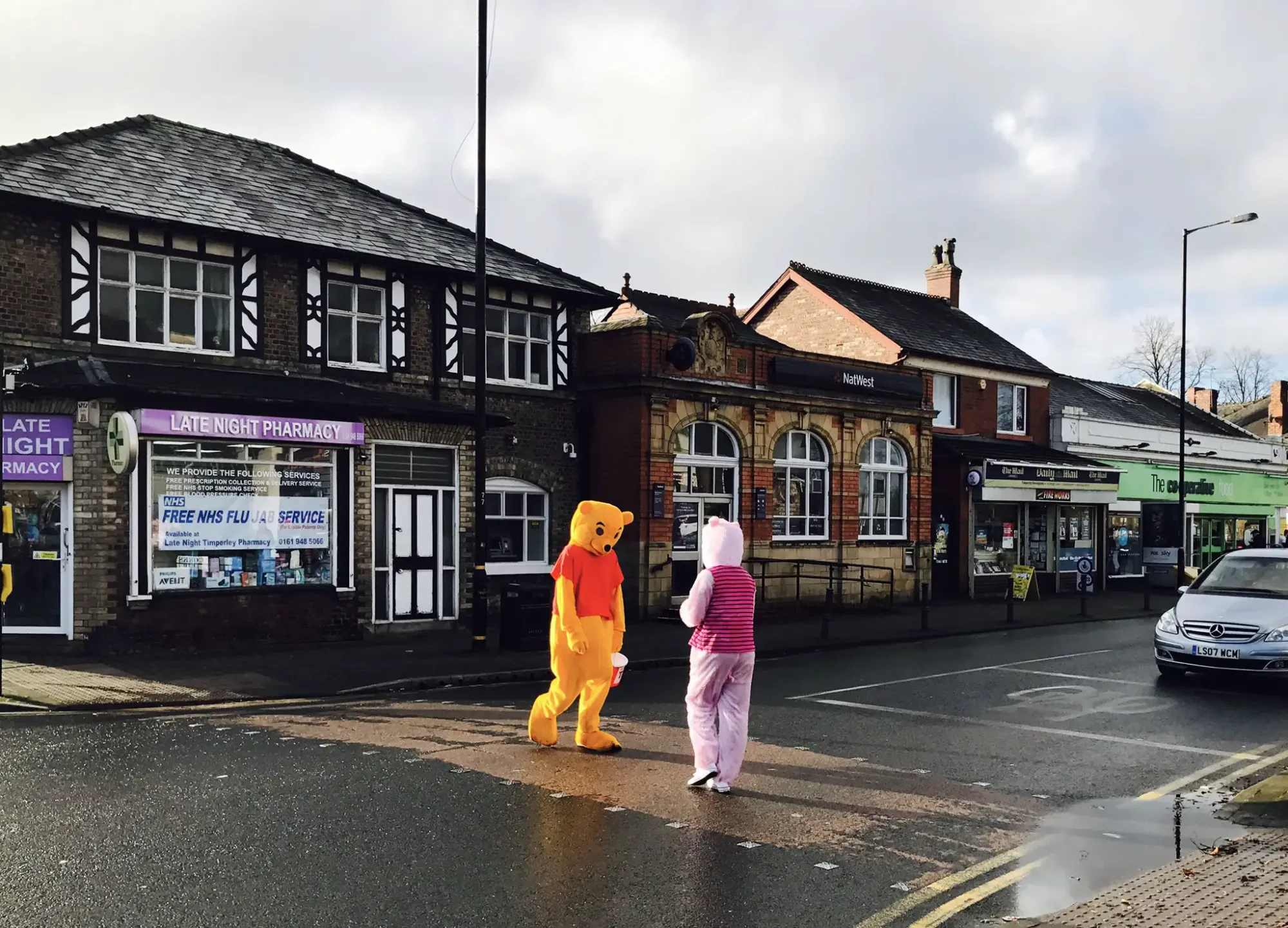 Students in fancy dress on the walk through Timperley