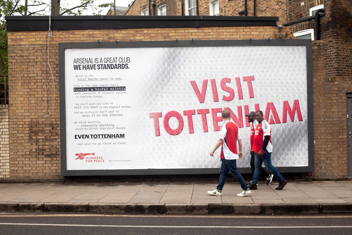 A Gunners for Peace poster. The headline says Visit Tottenham. The copy reads -