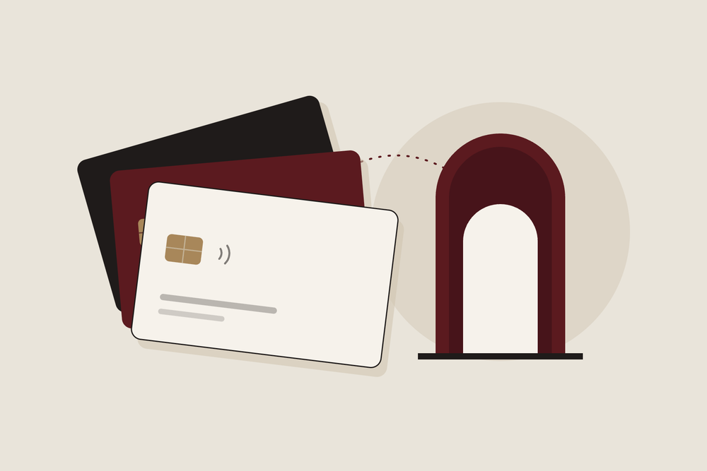 Illustration: three cards fanned beside an arched doorway