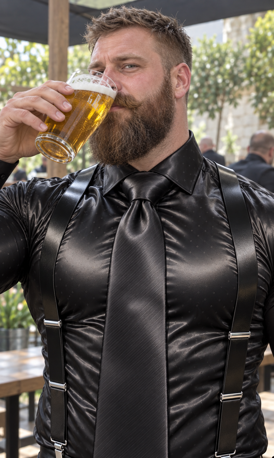 After Hour: black satin clothing, bearded men and drinks in a leafy beer garden.